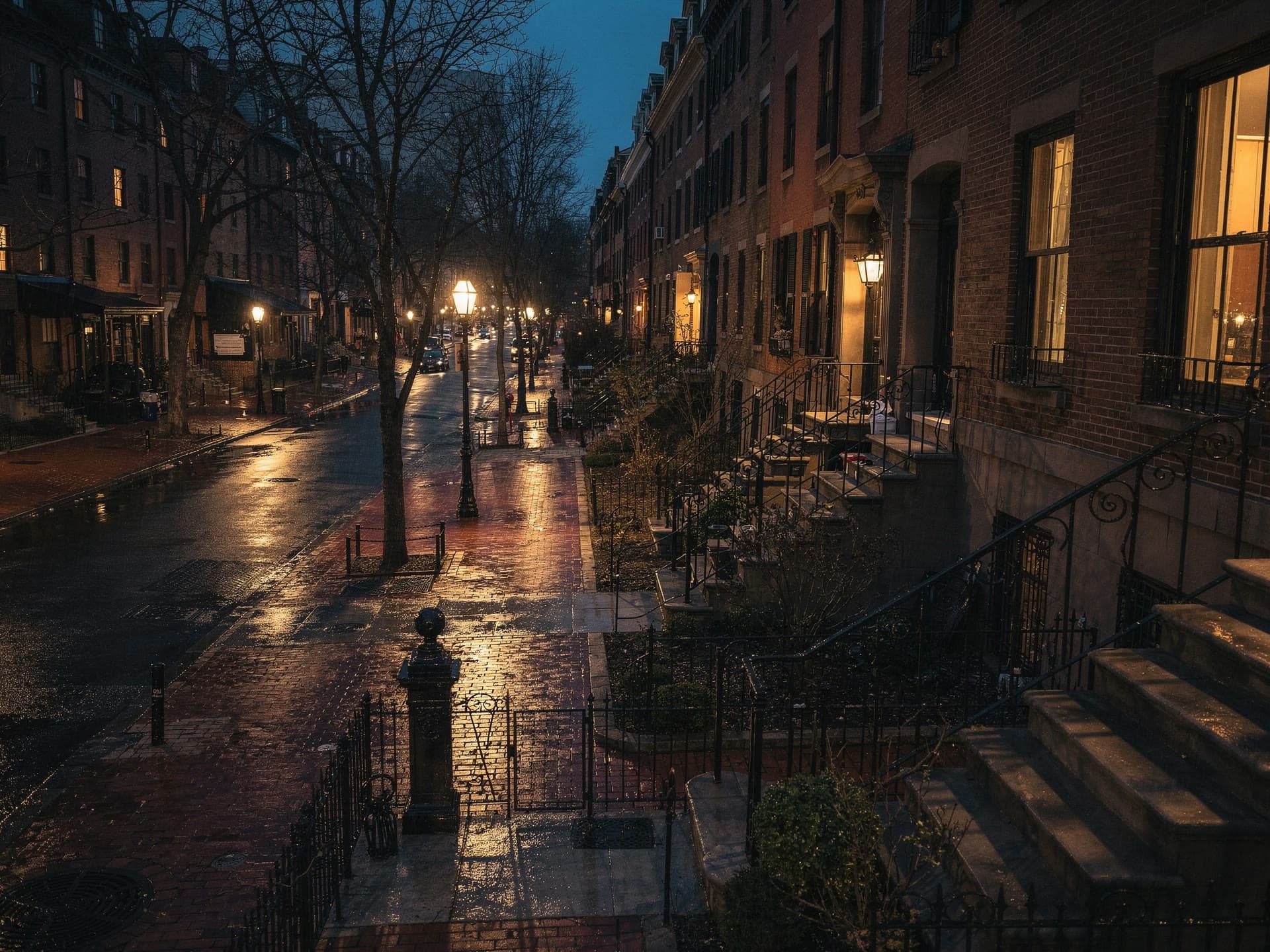 A wet Back Bay street late at night, brownstone stoops receding into the distance.