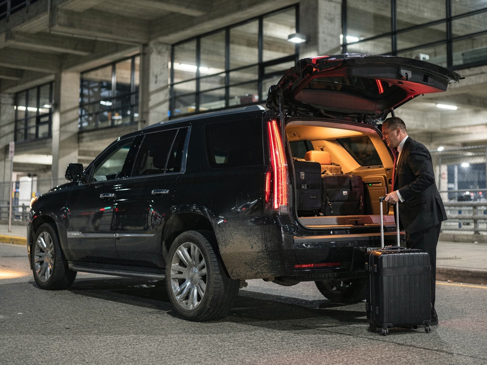 Black Cadillac Escalade luxury SUV from the El Khourys fleet