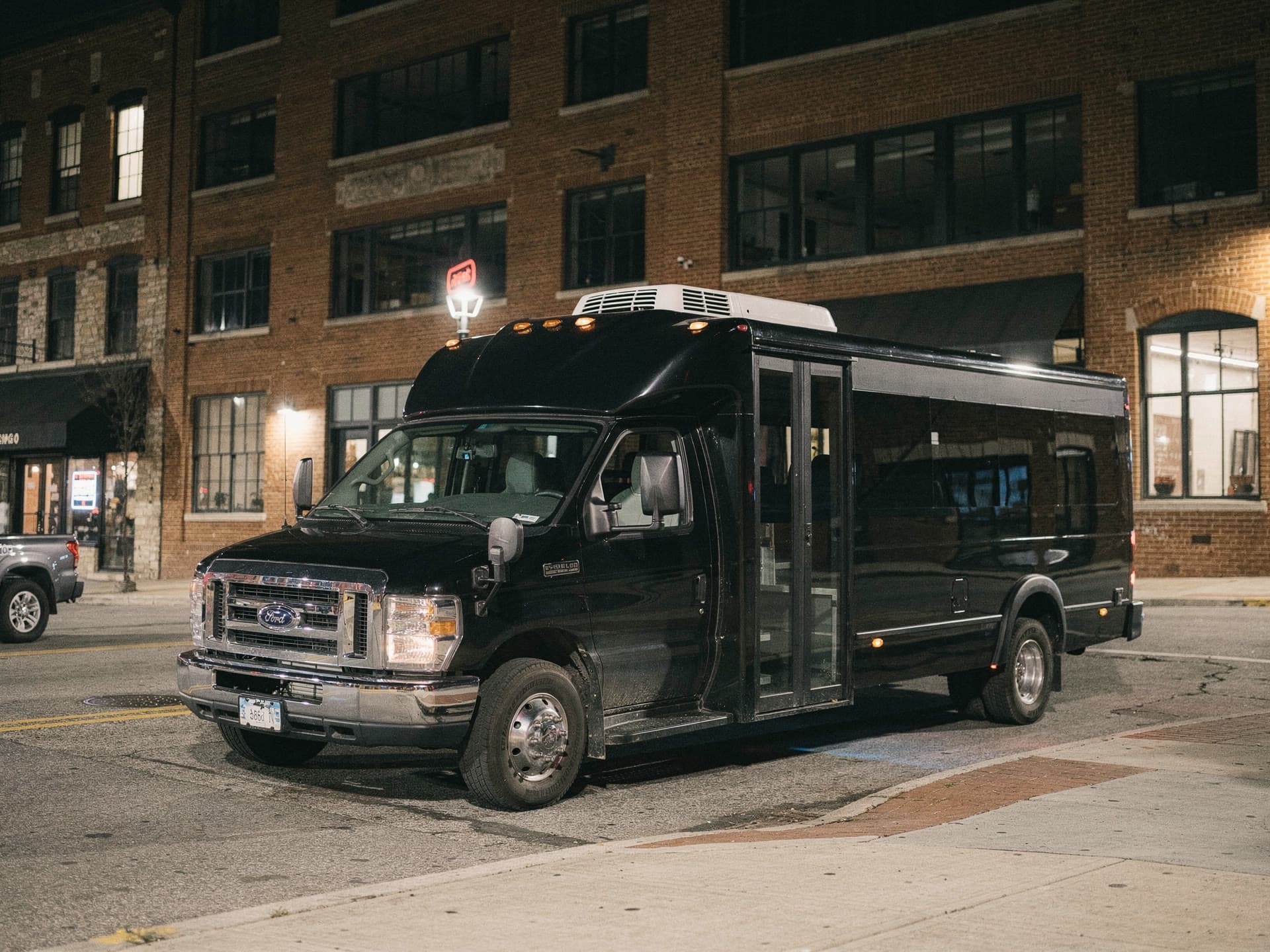 Black El Khourys party bus photographed outdoors